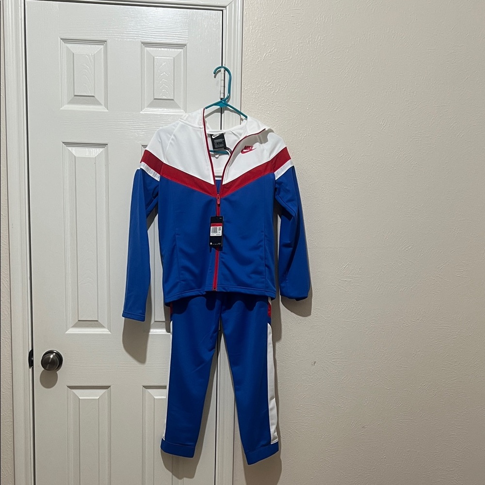 Nike Kids Blue and White tracksuit 
Brand New with tags